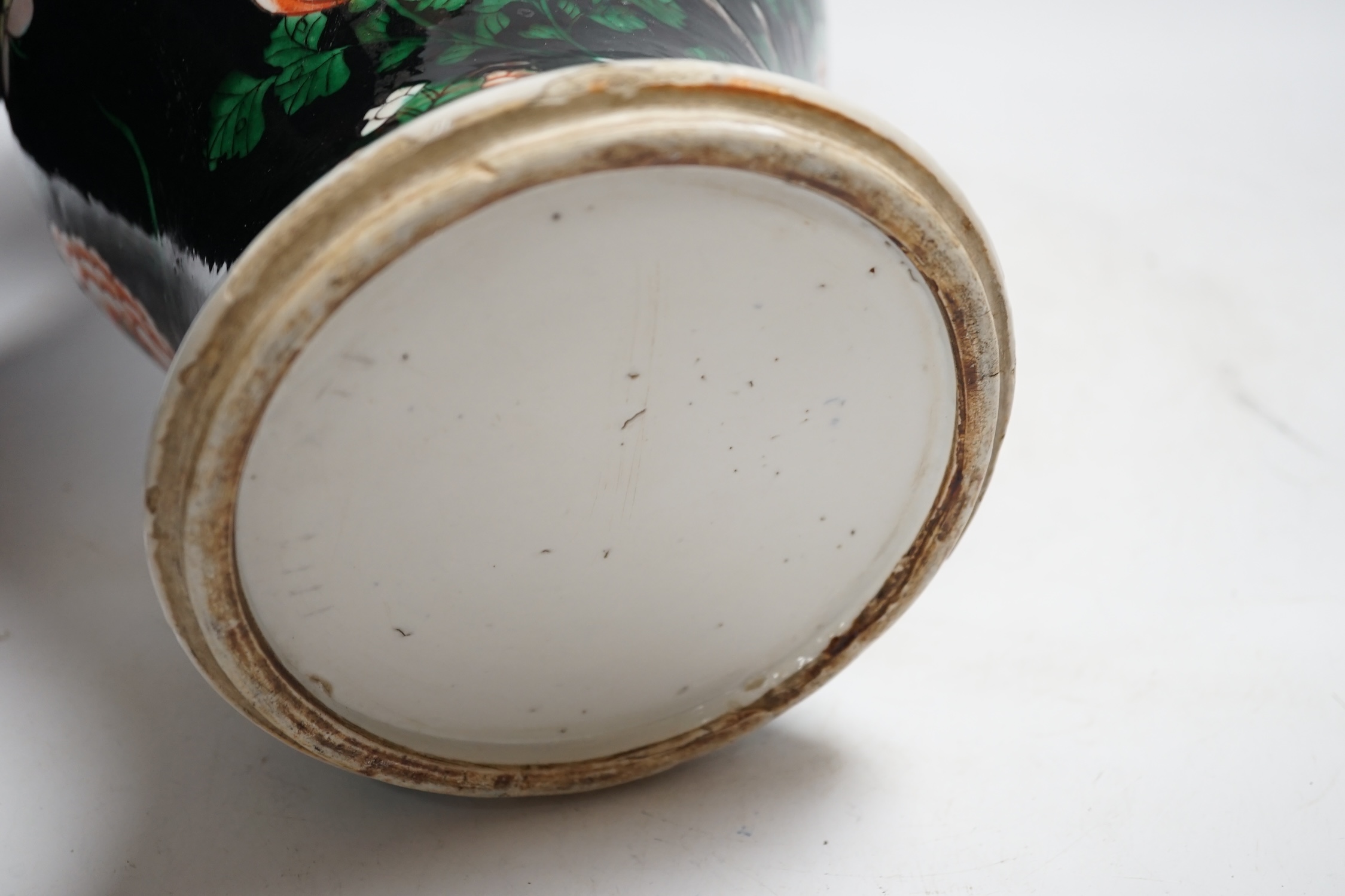 Three Chinese vases, 19th/early 20th century, including a cut down famille noire vase, crackleglaze and blue and white vases, tallest 34cm. Condition - fair to poor